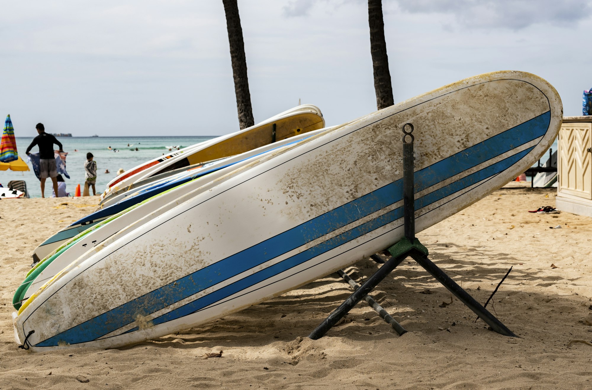 Surfboards in a board rack at Waikiki, Hawaii